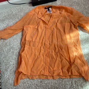 orange/peach sheer button up. size small